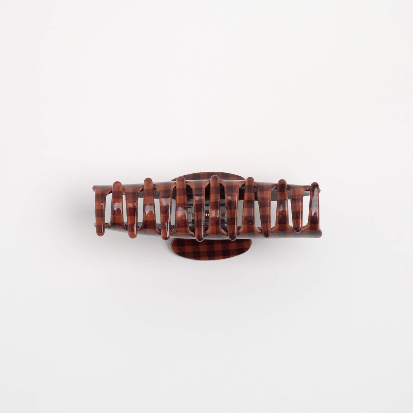 THOC Sorelle Claw Clip in brown and terracotta orange gingham shown from the bottom