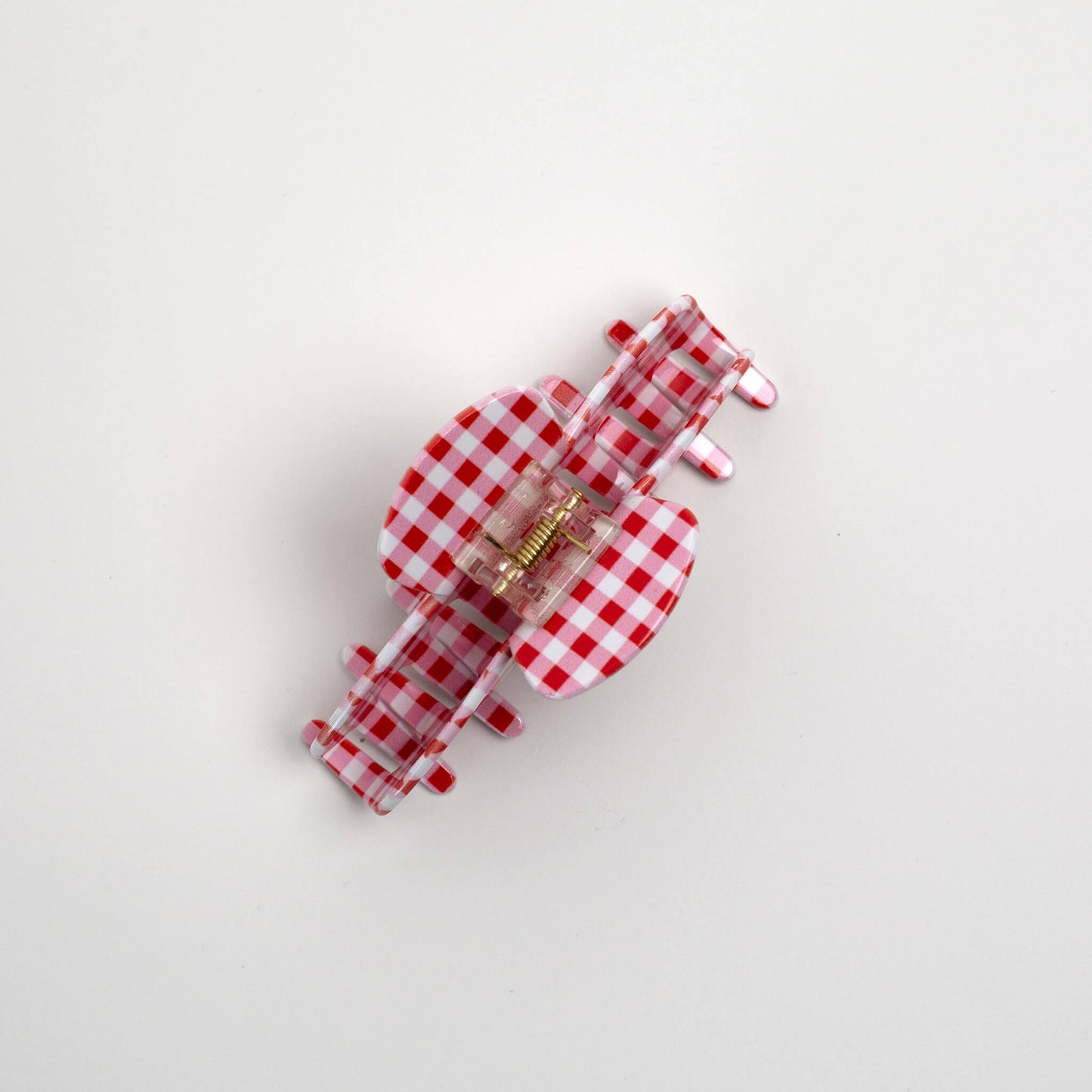 THOC Sorelle Claw Clip in Red and white  gingham shown from the top angle 