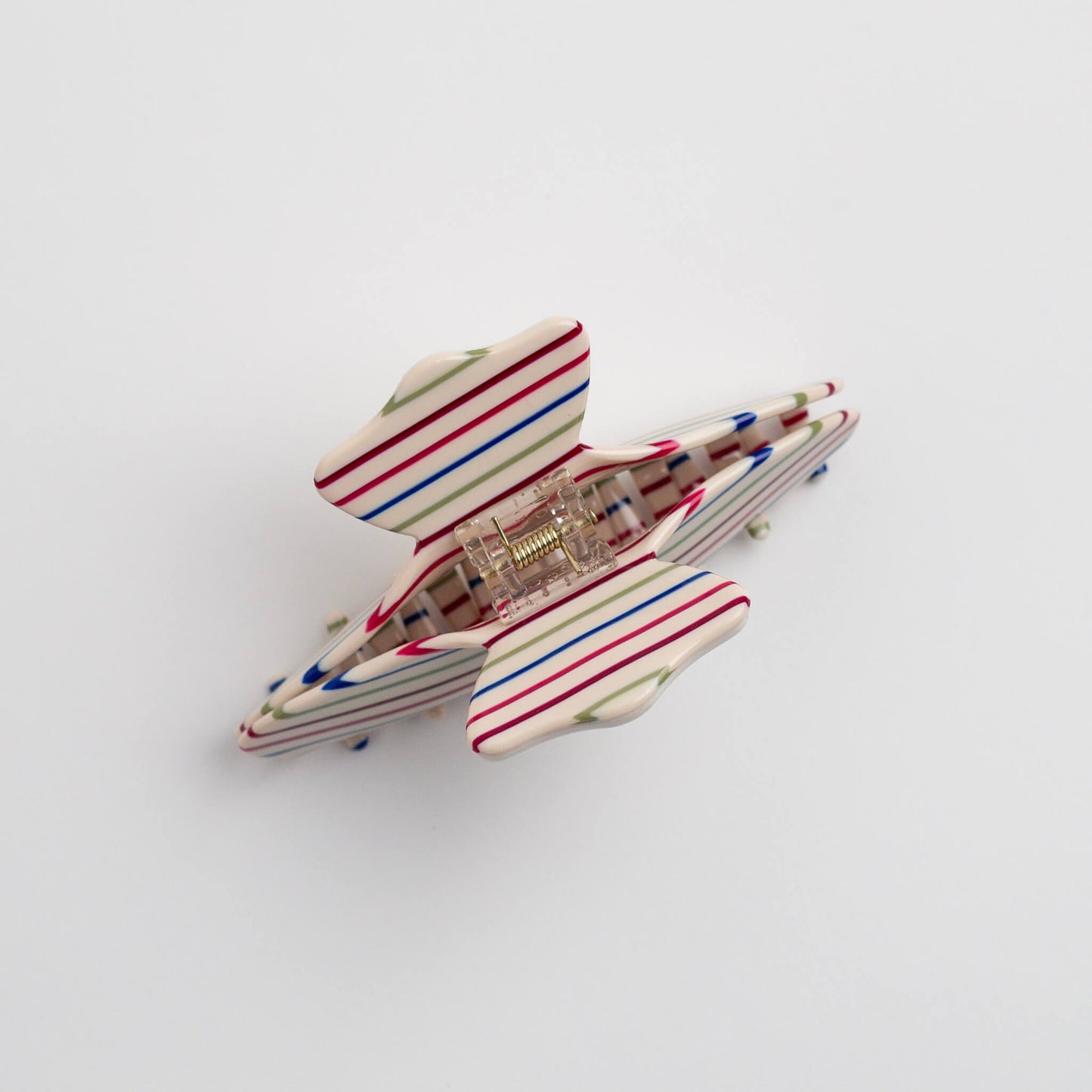 THOC Gigi Claw Clip in Cream Stripe Dream colour with claws facing down, on a white background