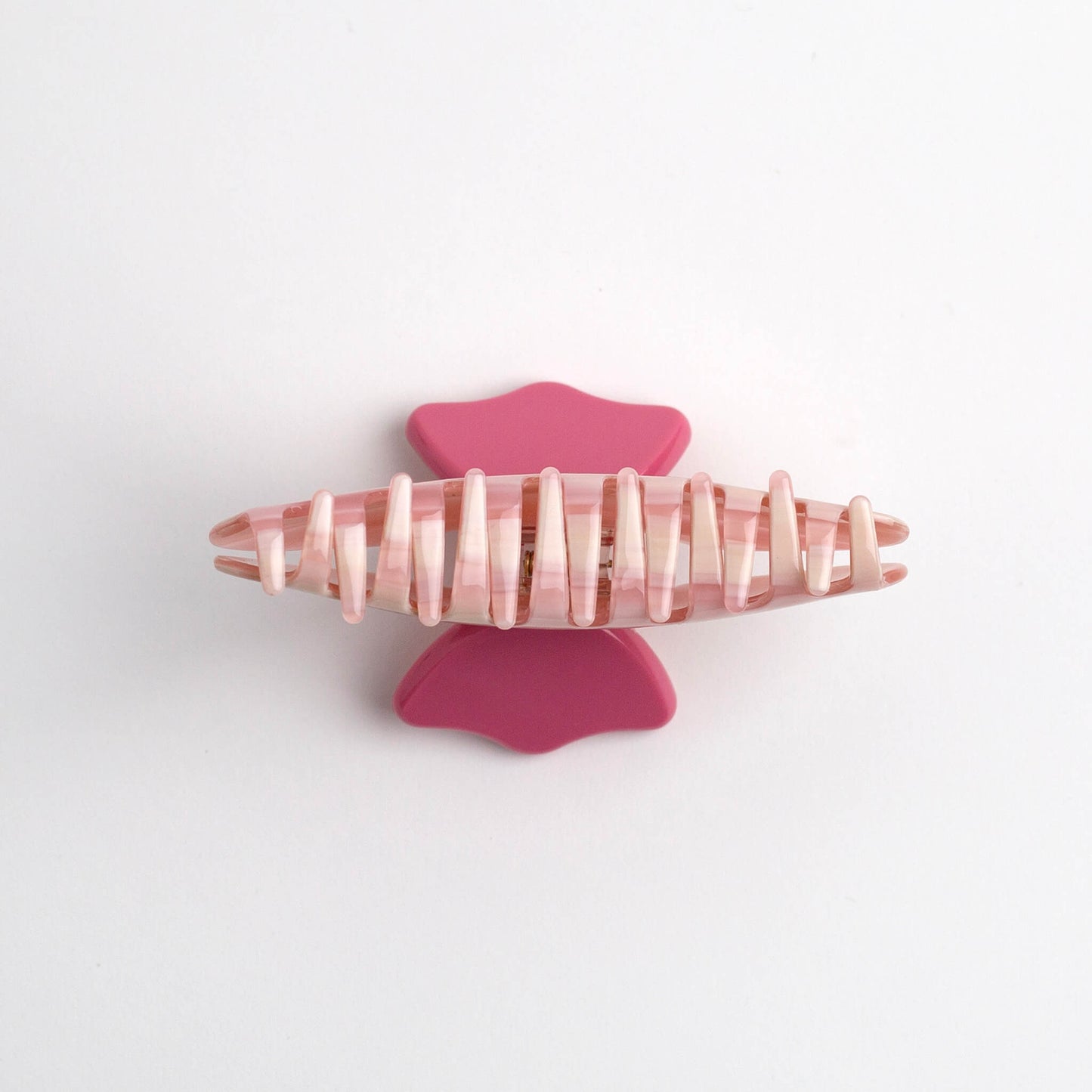 THOC Gigi Claw Clip in Pink Candy Cloud colour claws facing up on a white background