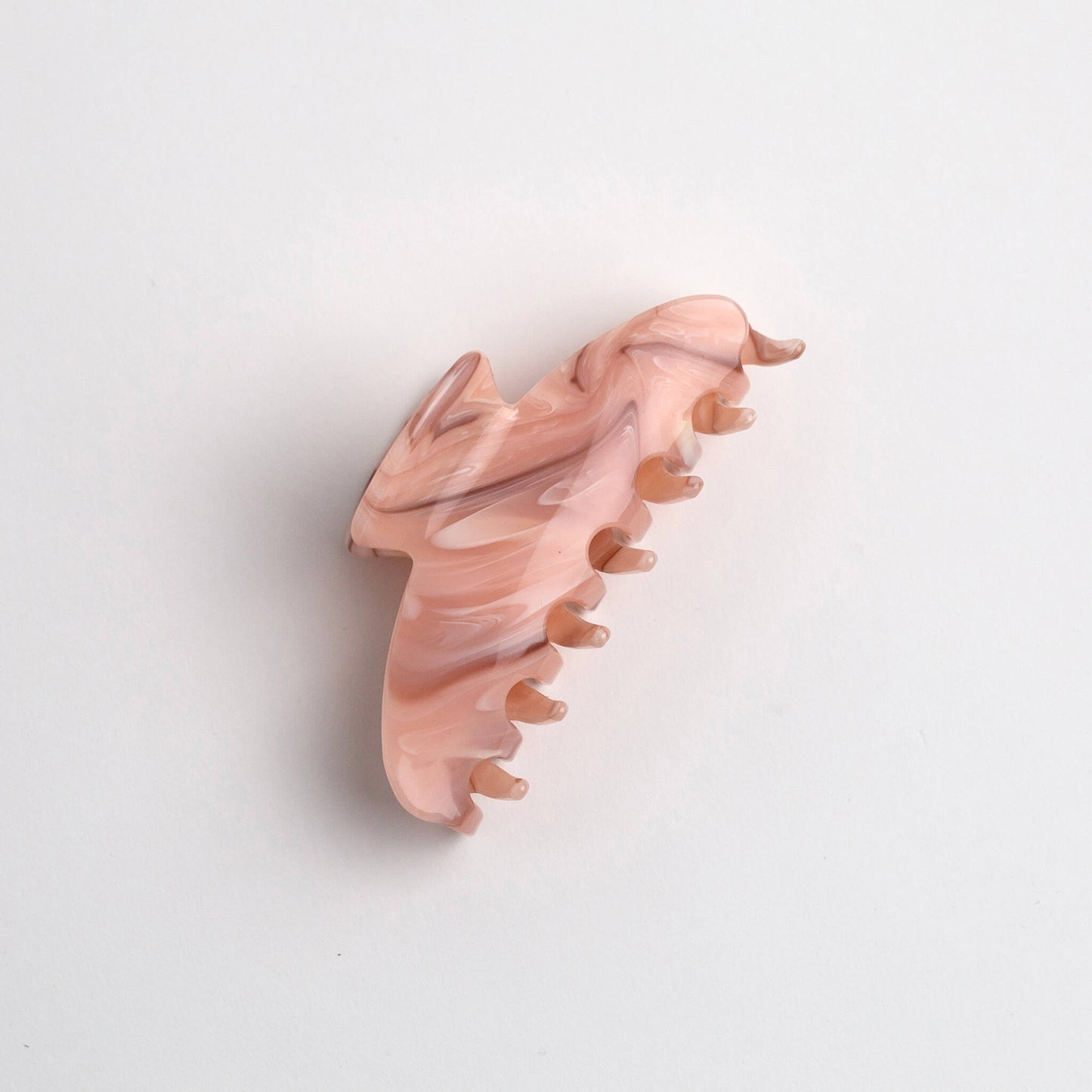 THOC Noa Claw Clip in Candy Floss colour on its side on a white background