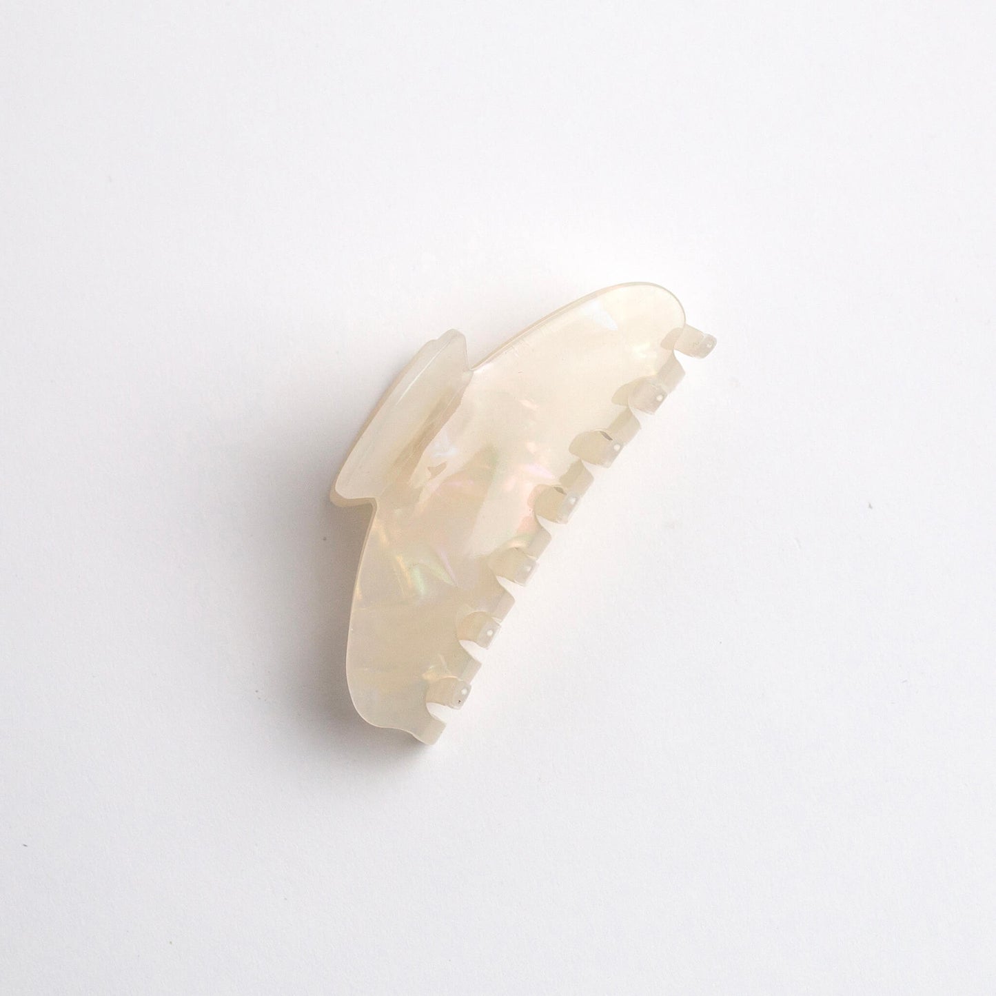 THOC Sofie Claw Clip in Iced Tea colour on its side on a white background