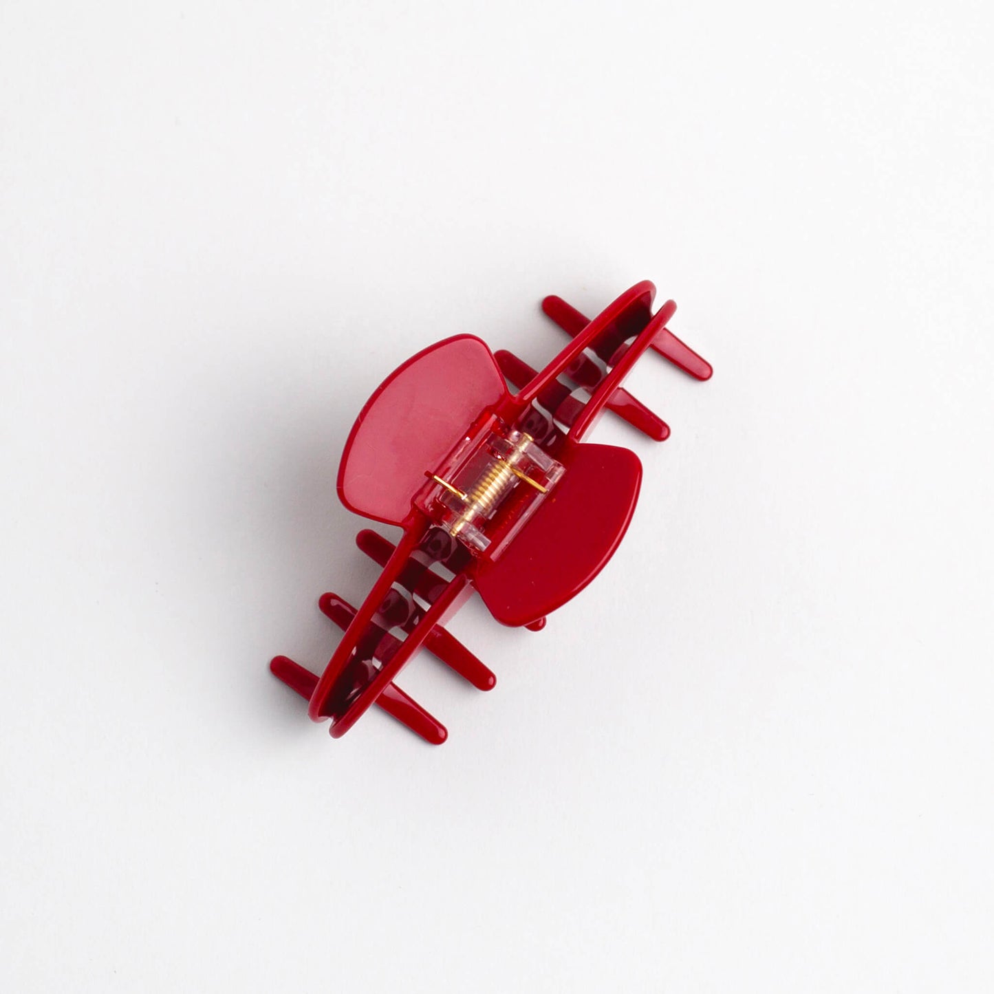 Sloane Claw Clip Red Velvet on white background with claws facing downwards