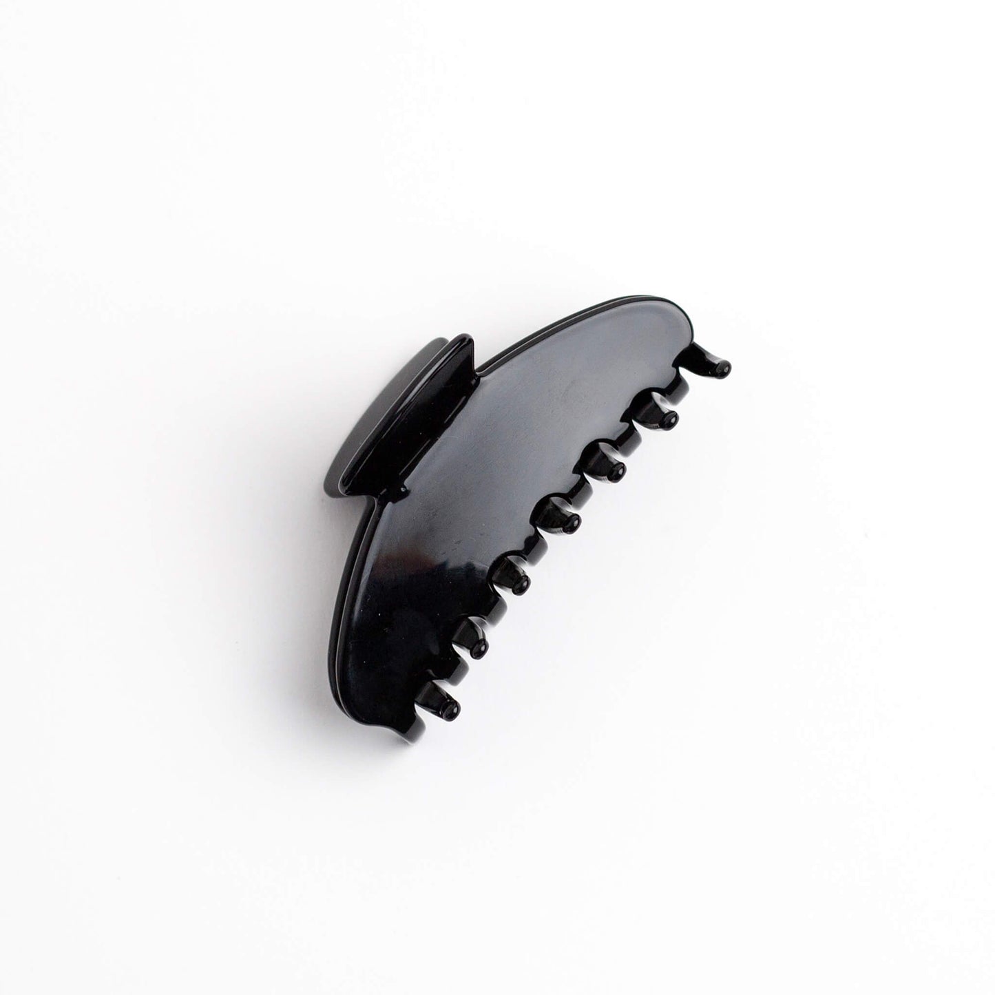 THOC Sloane Claw Clip in Espresso colour on its side on a white background