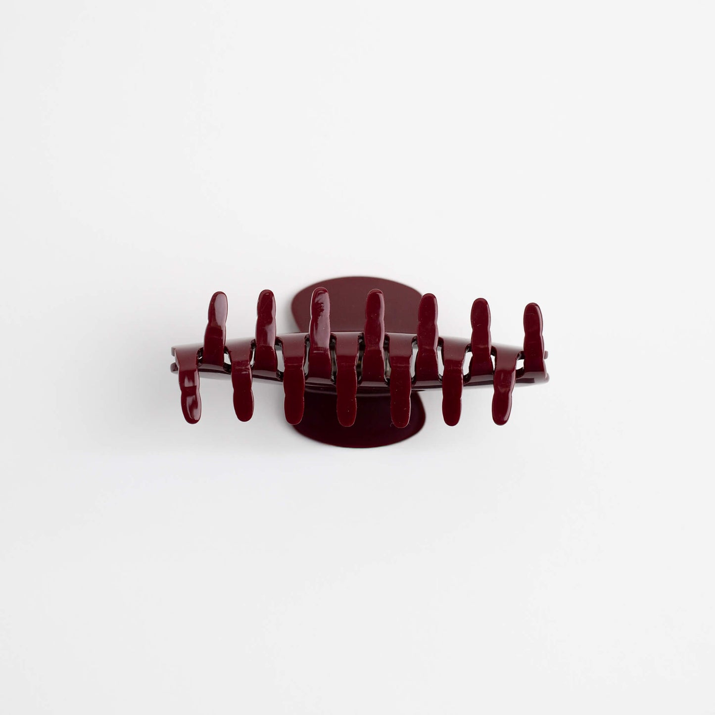 THOC Sloane Claw Clip in Maroon Torte colour claws facing up on a white background