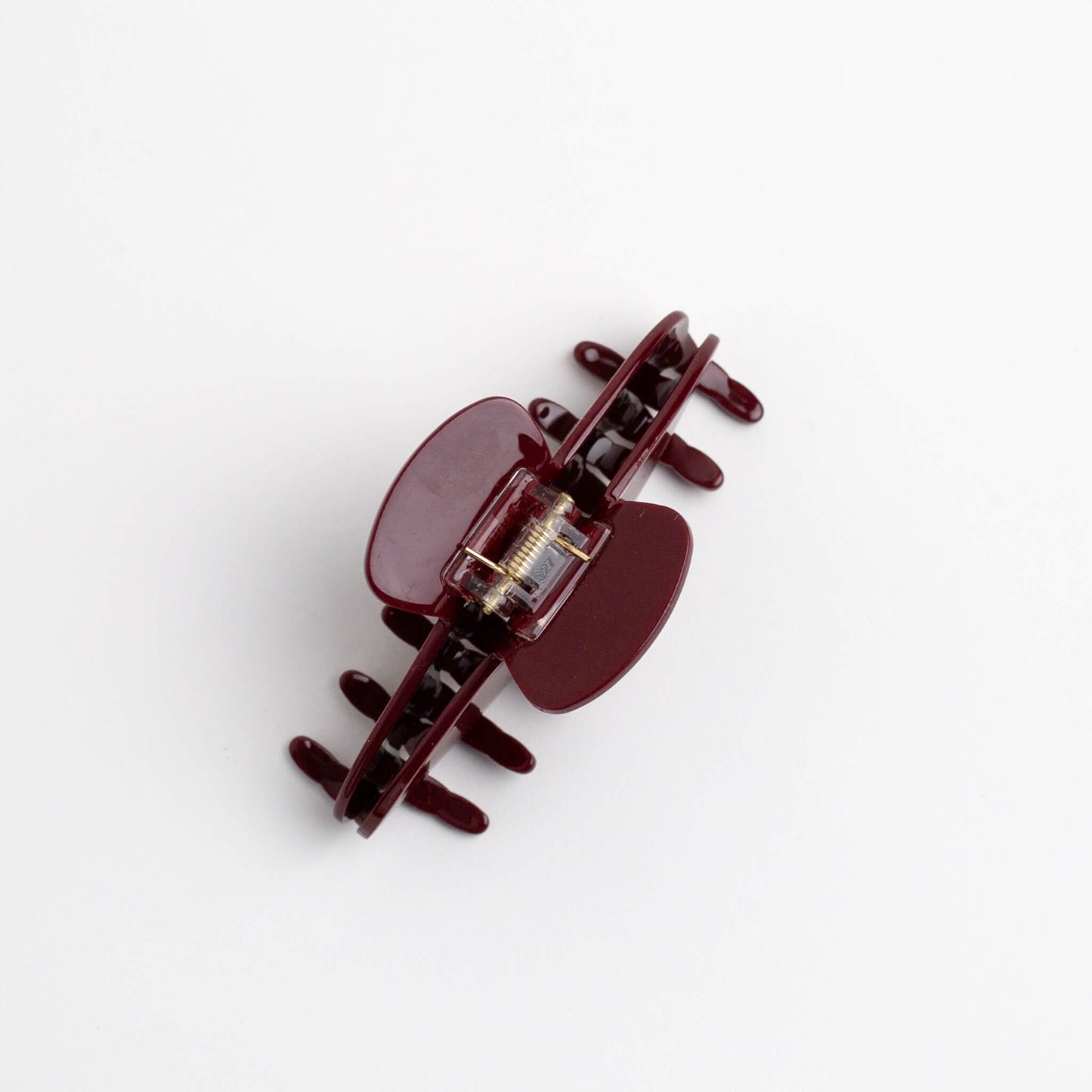 THOC Sloane Claw Clip in Maroon Torte colour with claws facing down, on a white background