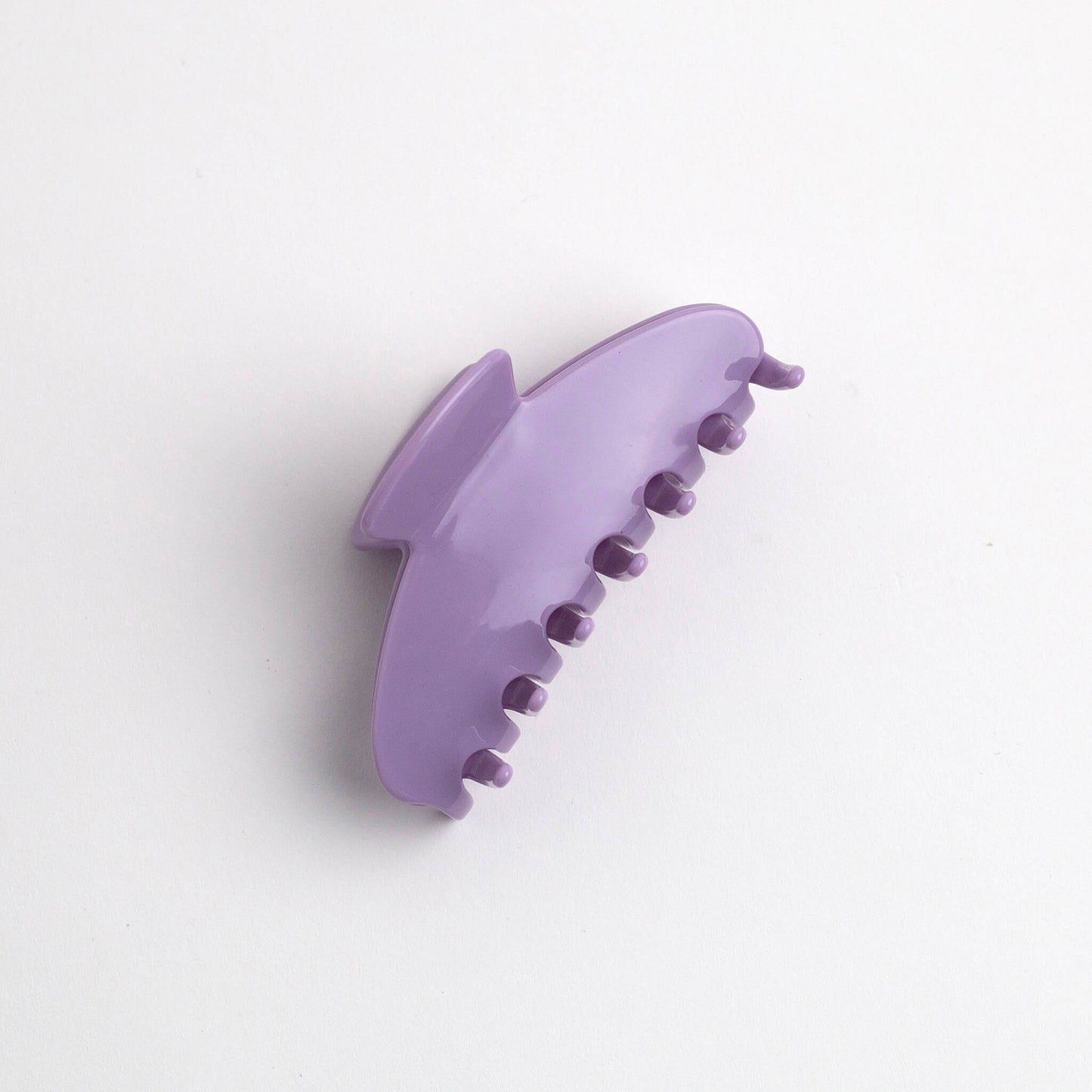 THOC Giselle Claw Clip in Lilac Pop colour on its side on a white background