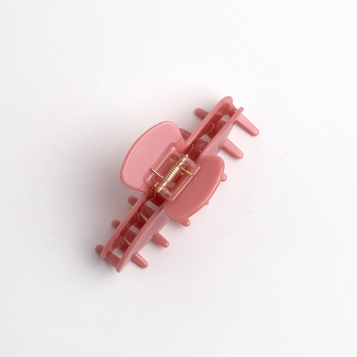 THOC Giselle Claw Clip in Candy Pink colour with claws facing down, on a white background