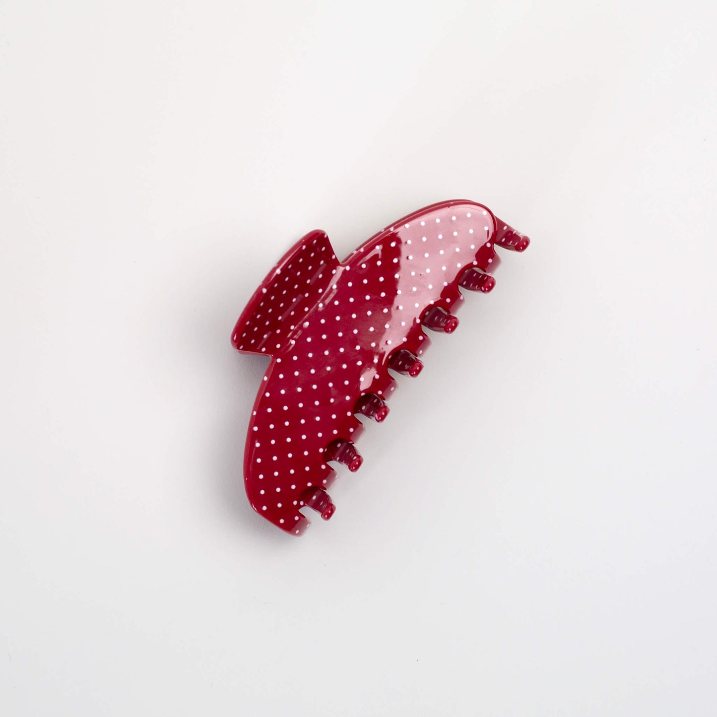 THOC Gina Claw Clip in Red with white polka dot shown from the side