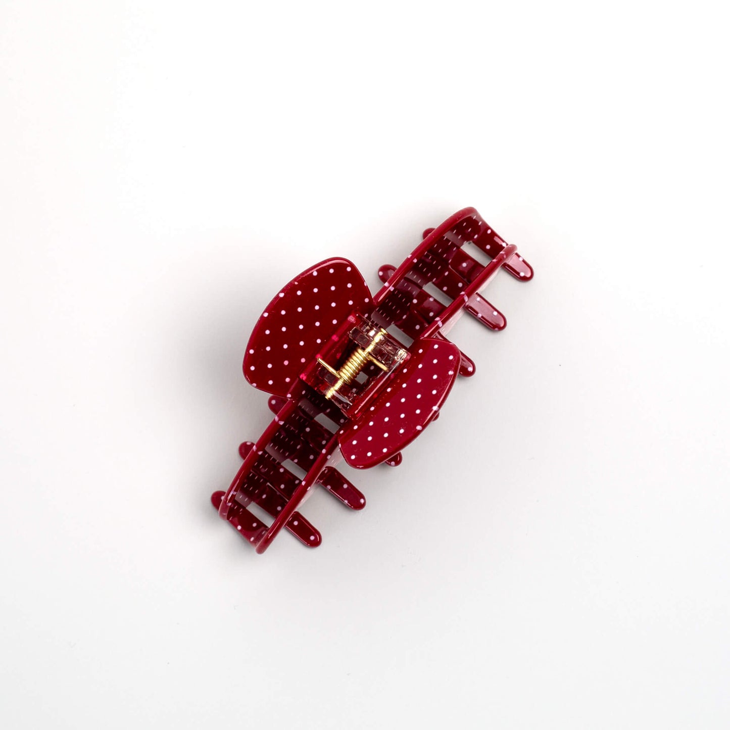 THOC Gina Claw Clip in Red with white polka dot shown from the top angle 
