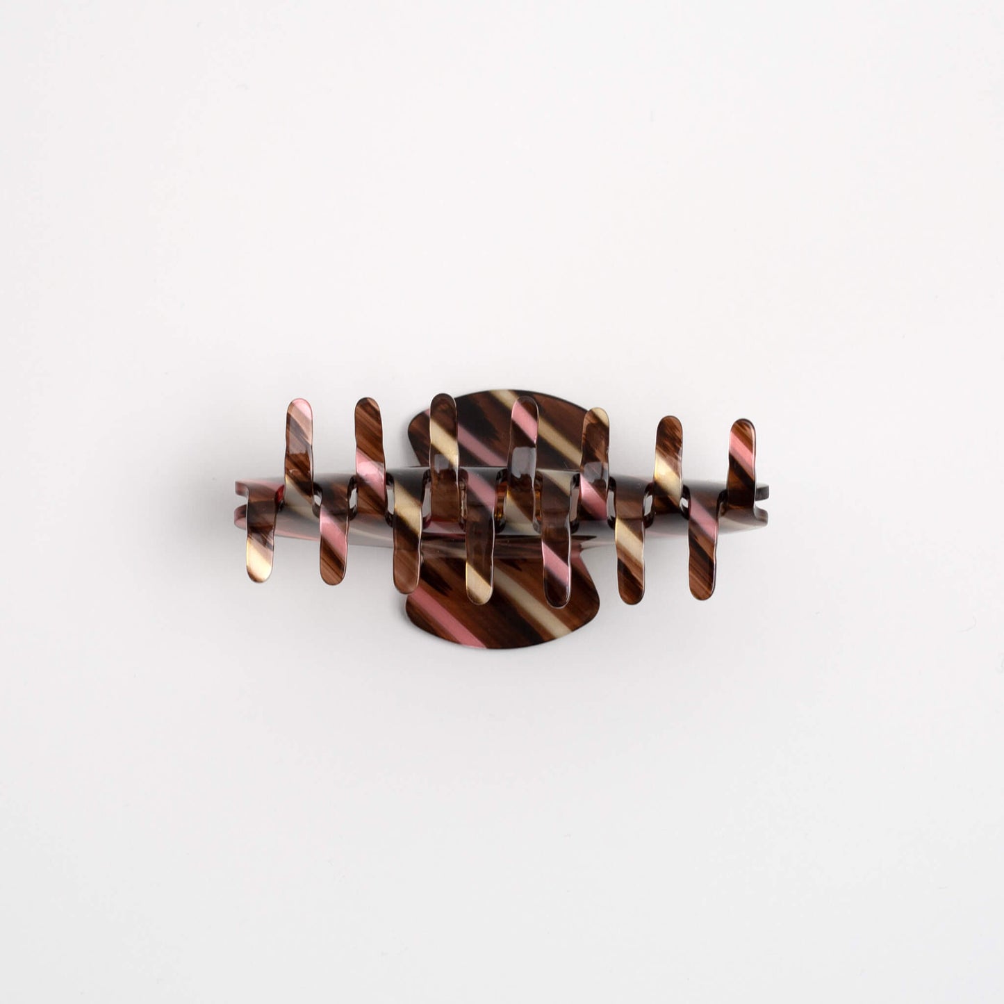 THOC Mina Claw Clip in striped Tortoiseshell shown from the bottom