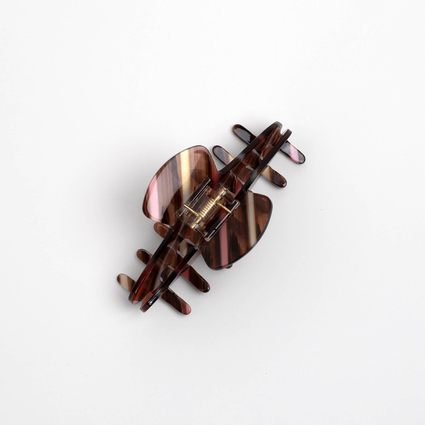 THOC Mina Claw Clip in striped Tortoiseshell shown from the top angle