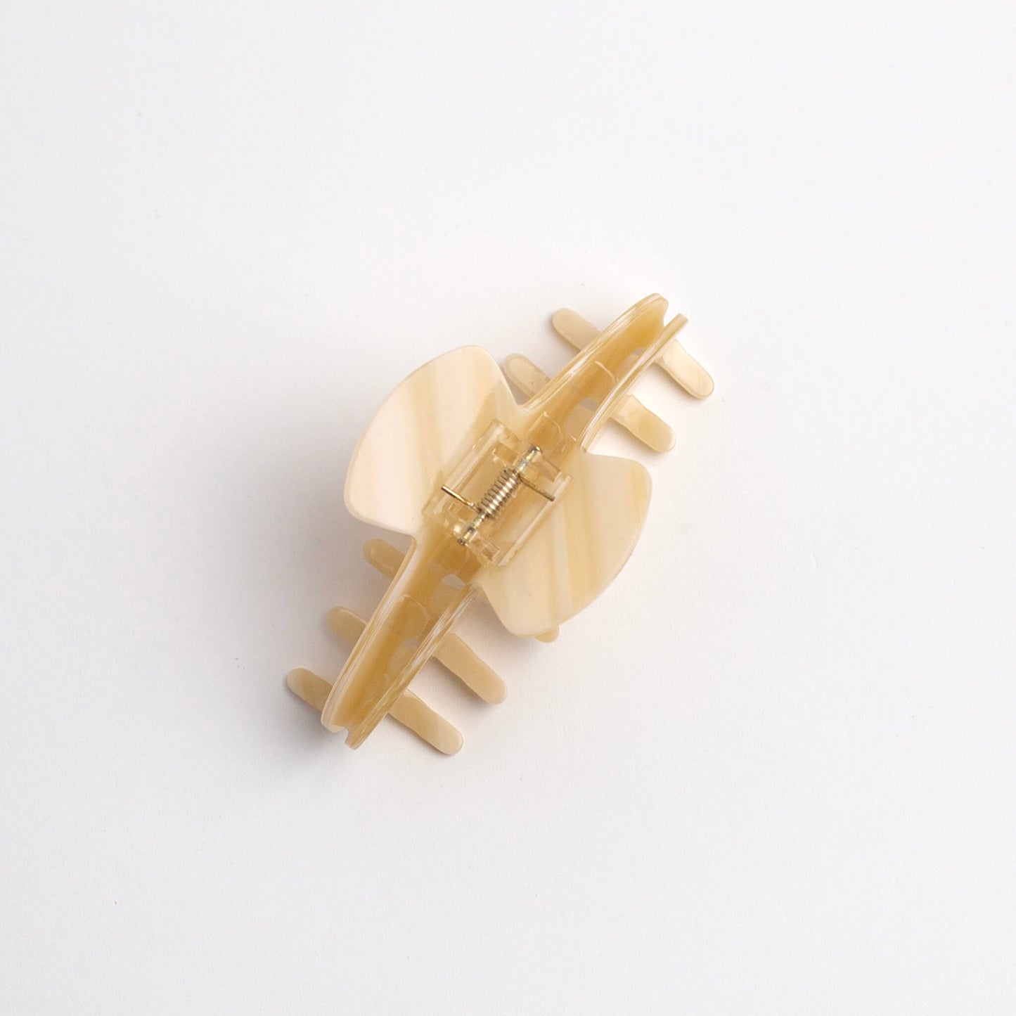 THOC Lemi Claw Clip in Lemon Luxe colour with claws facing down, on a white background