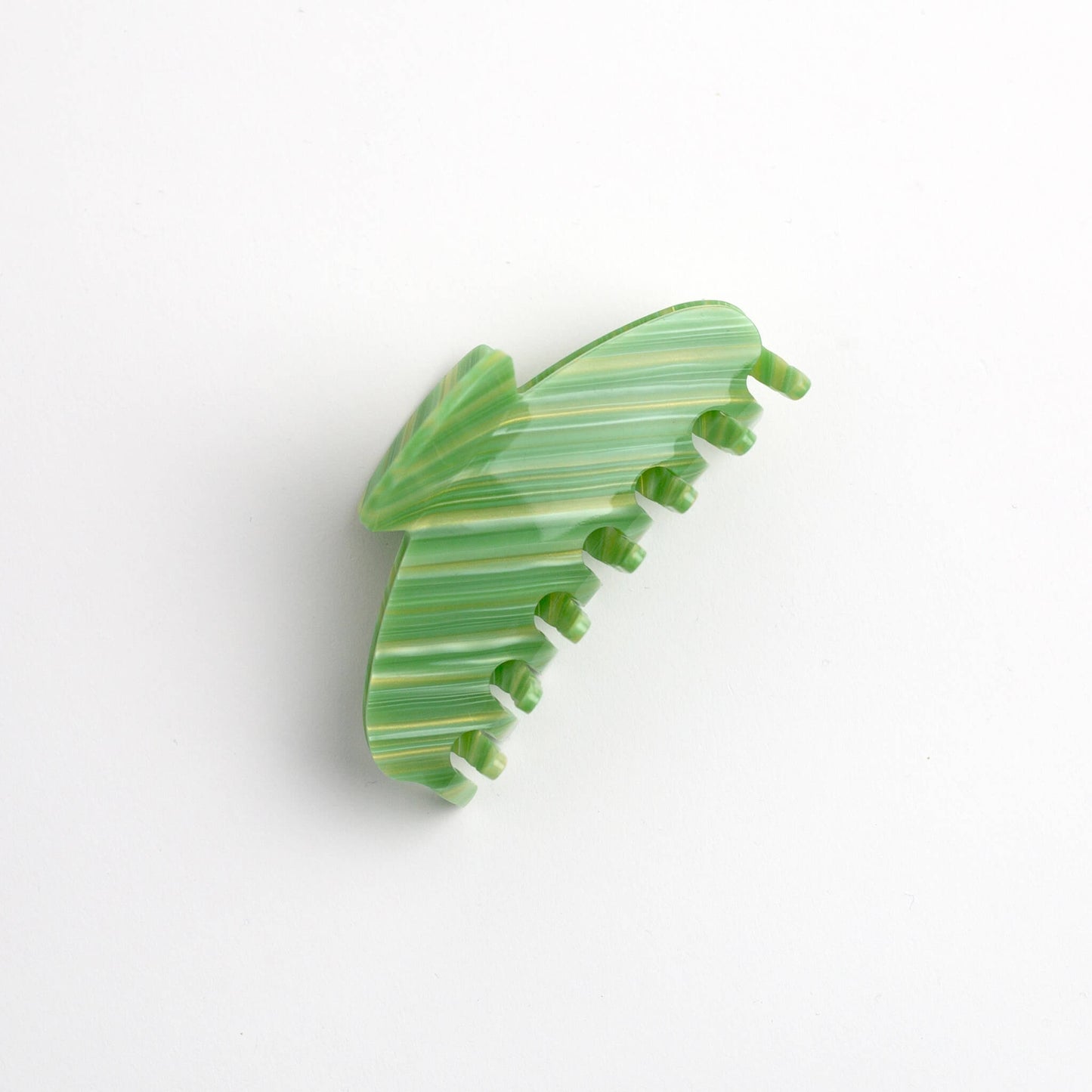 THOC Lemi Claw Clip in Sweet Matcha colour on its side on a white background