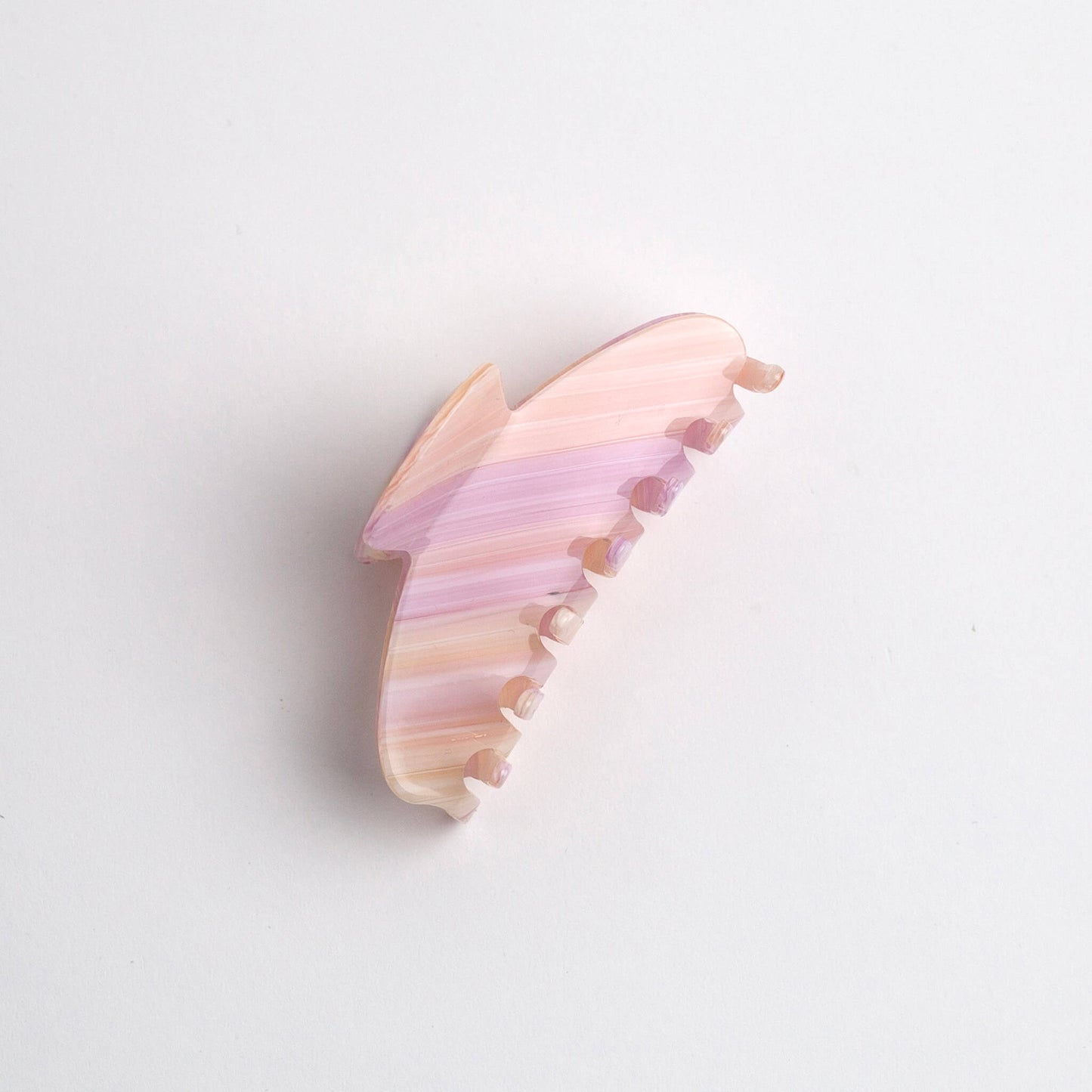 THOC Lemi Claw Clip in Pink Crush colour on its side on a white background