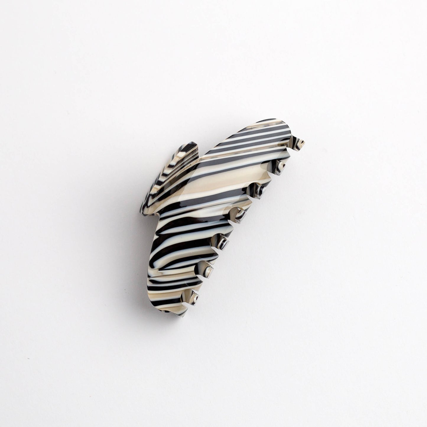 THOC Lemi Claw Clip in Iced Coffee colour on its side on a white background