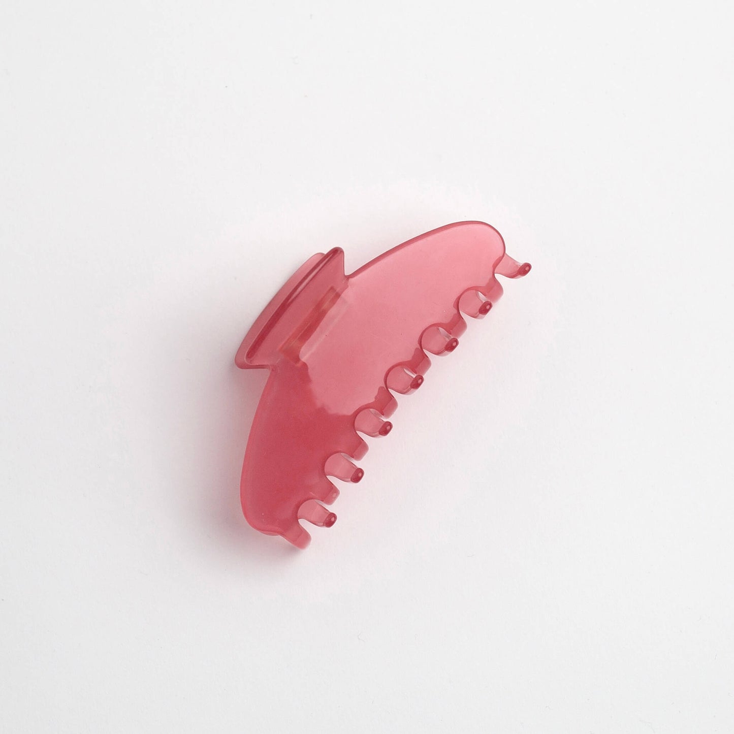 THOC Giselle Claw Clip in Rose Blush colour on its side on a white background