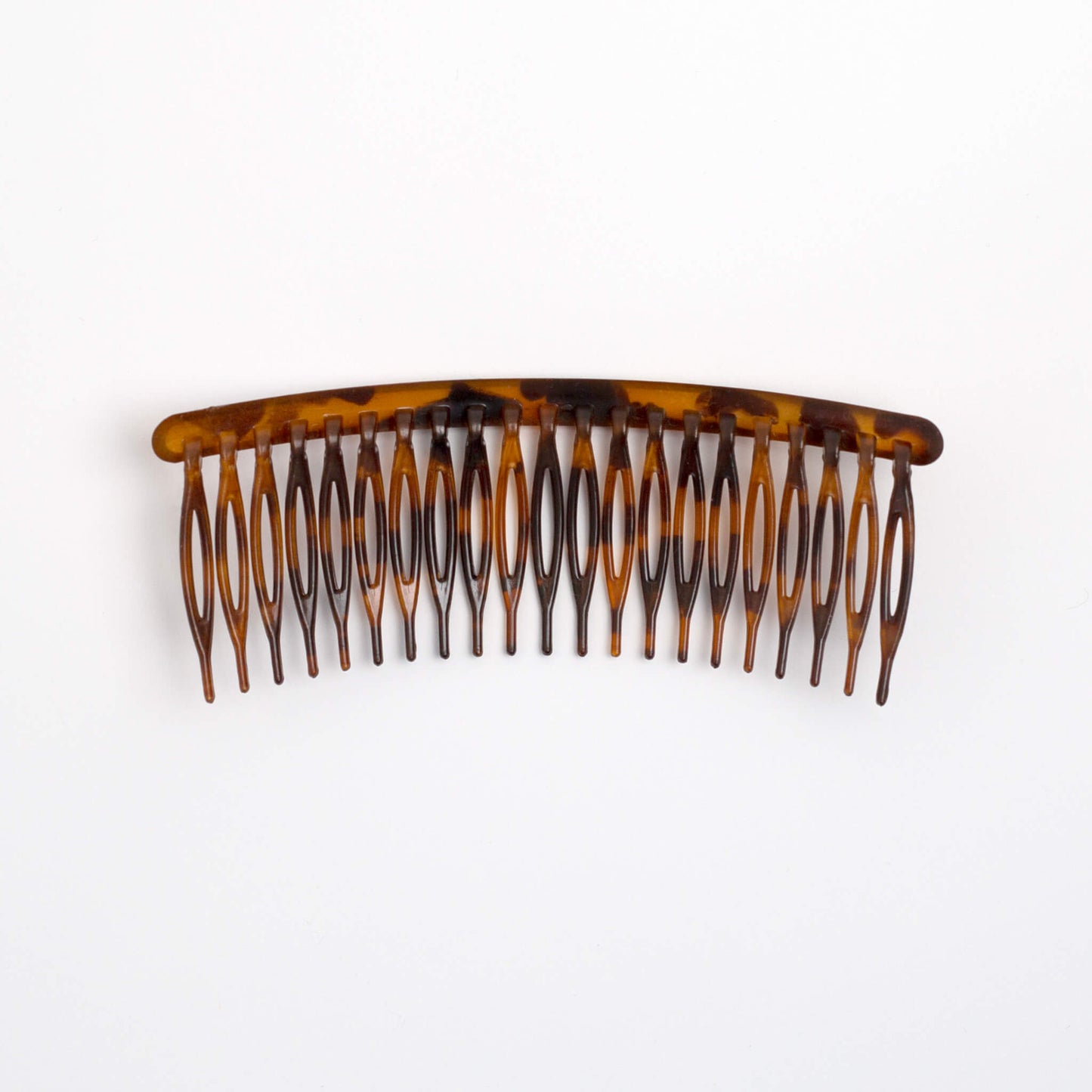 THOC Eloise French comb, wide, shown from the reverse side in brown sugar colour brown tortoiseshell