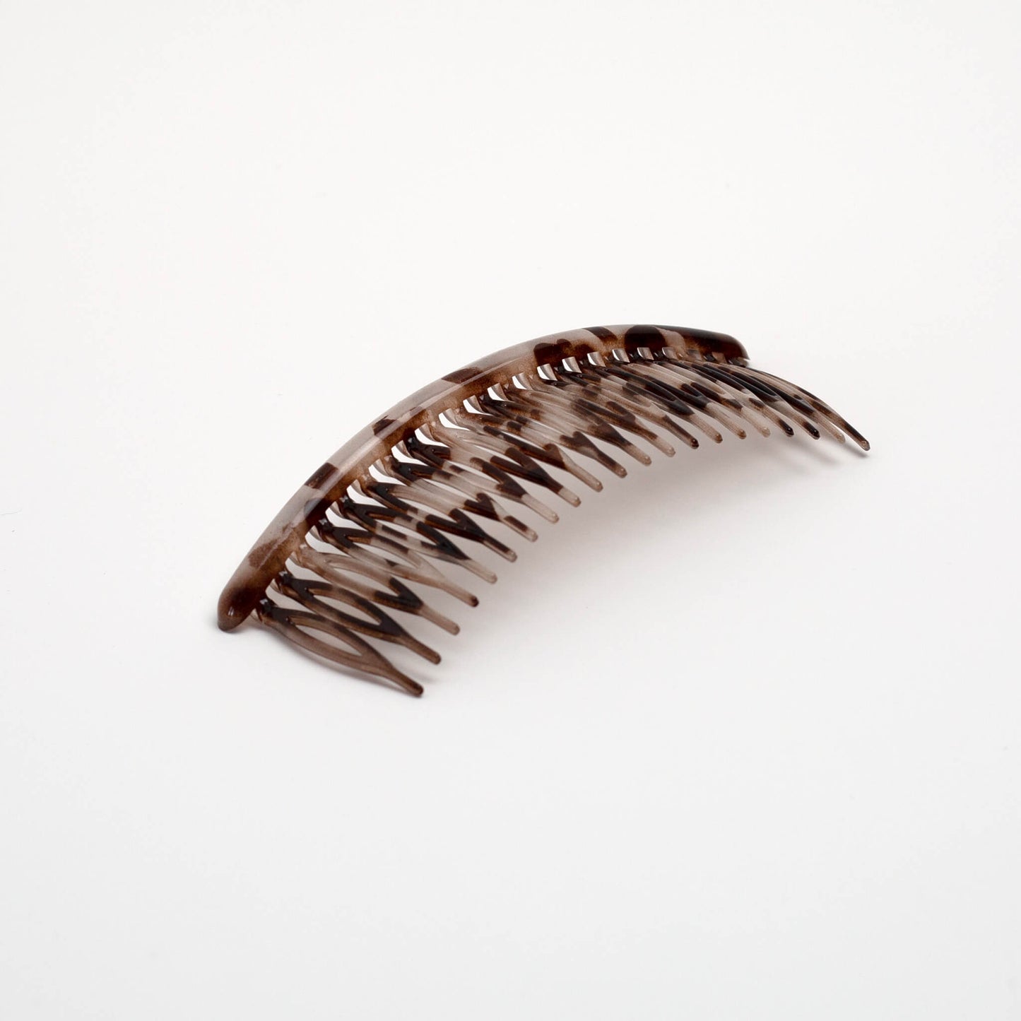 THOC Eloise French comb, wide, shown at an angle in light tortoiseshell