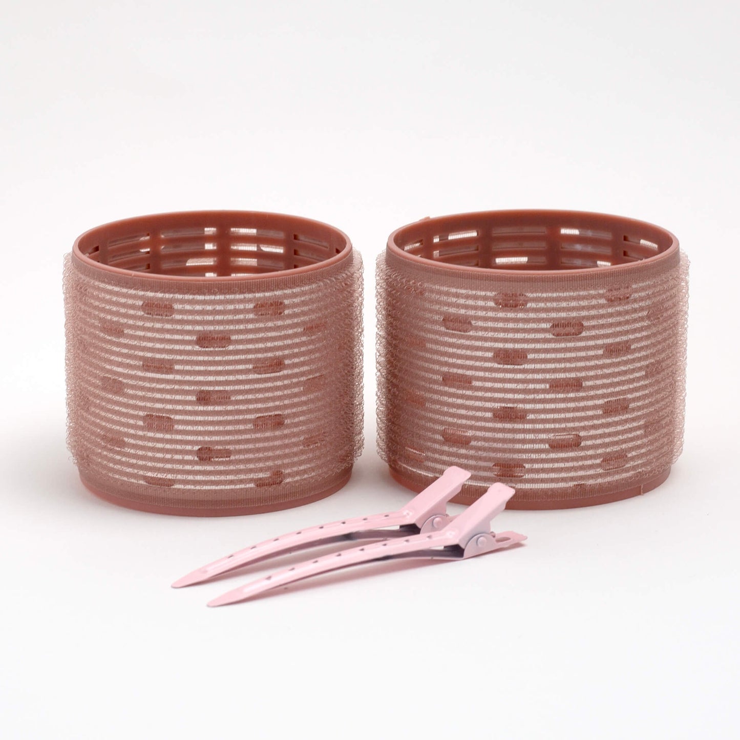 THOC Ceramic Thermal Hair Rollers Two large sized shown upright with hair pins lying next to