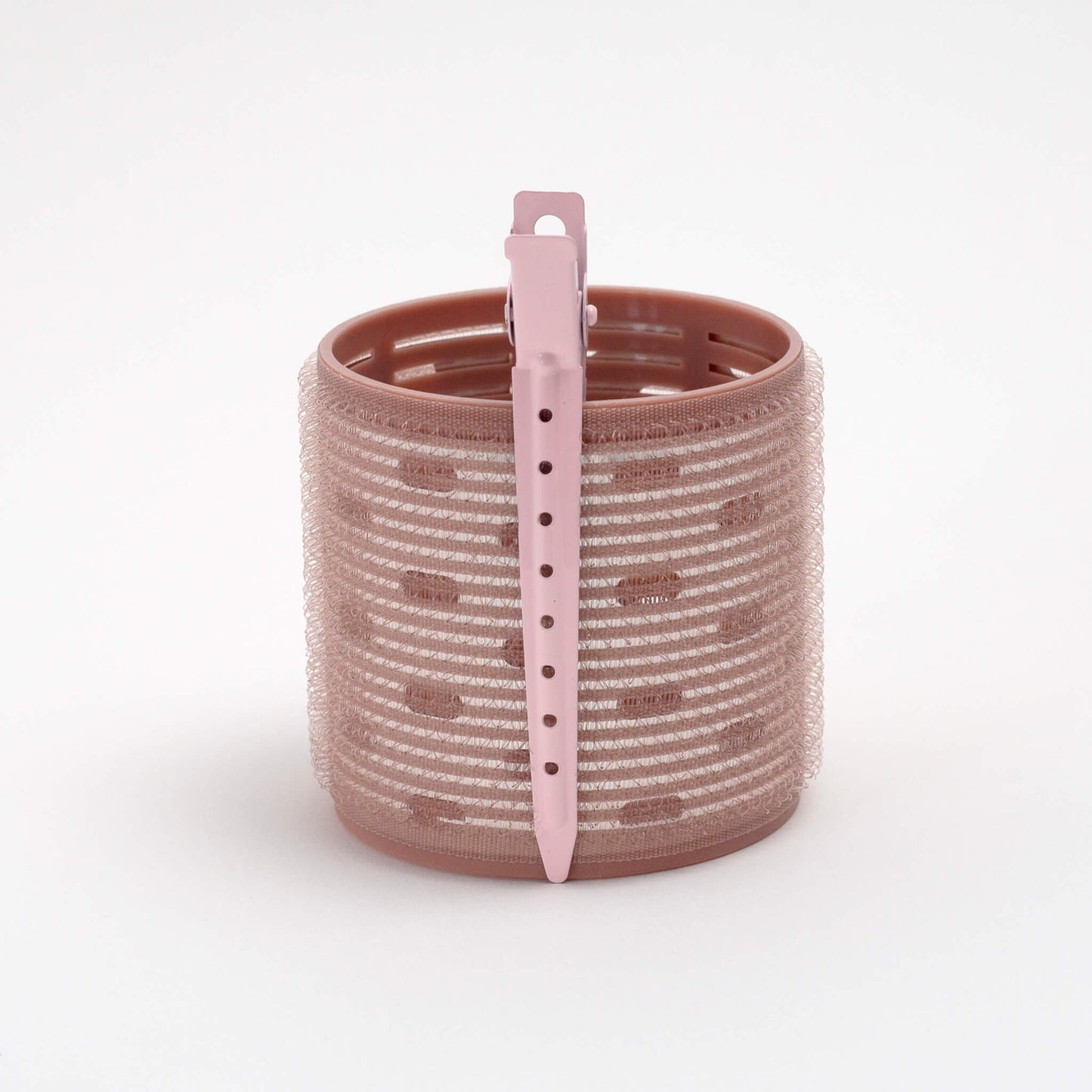 THOC Ceramic Thermal Hair Roller One medium sized shown with hair pin, standing upright
