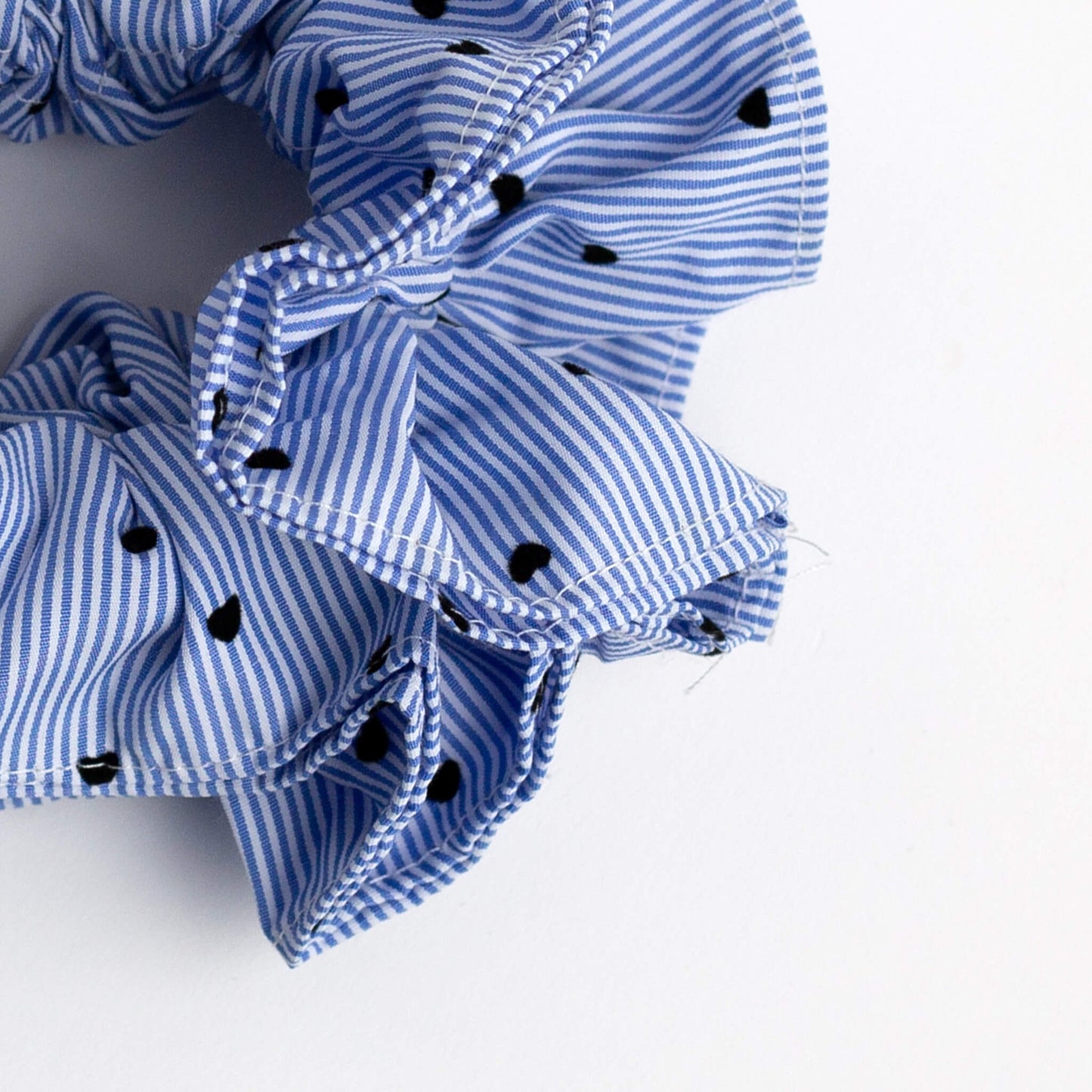 Close up of THOC Bloom Double Layer Scrunchie Blue Stripe on white background