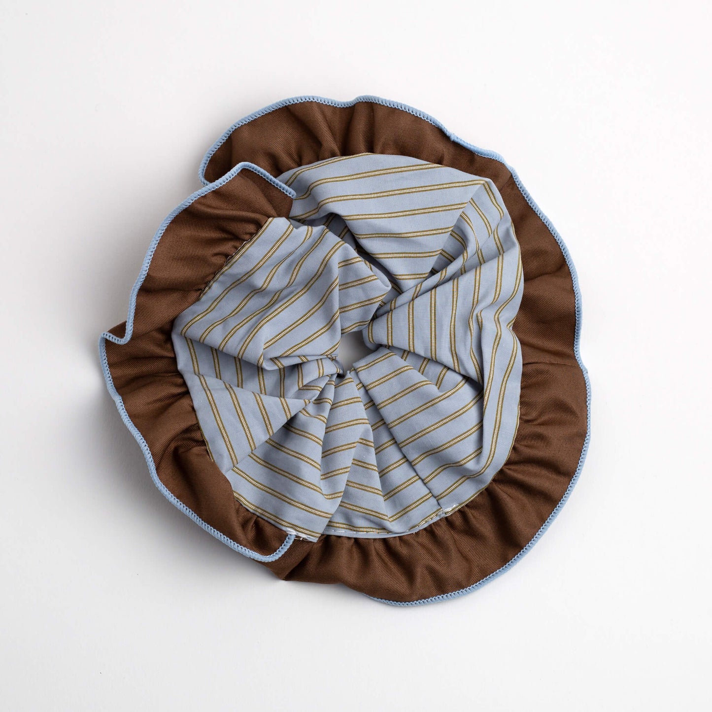 Close up of Bloom Trimmed Scrunchie Blue Stripe on white background