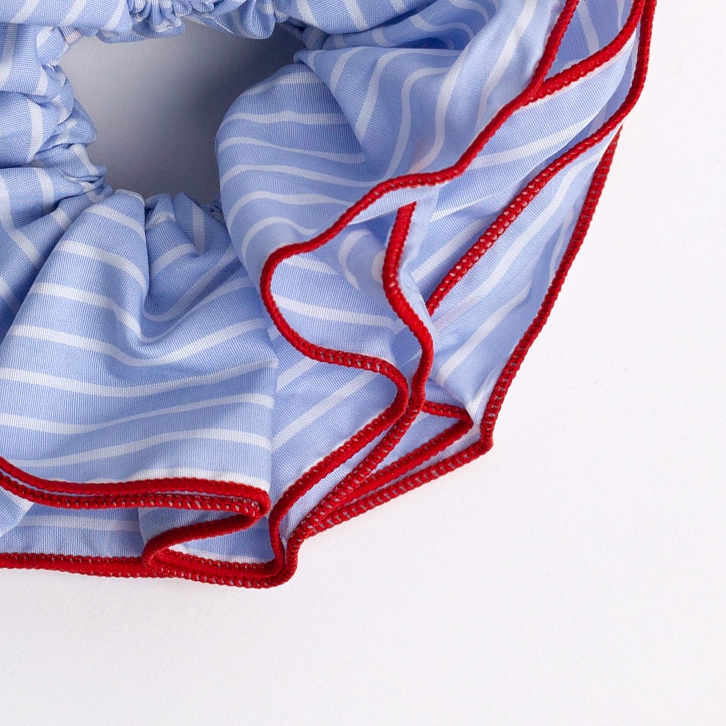 Close up of THOC Bloom Double Layer Scrunchie Blue Stripe on white background