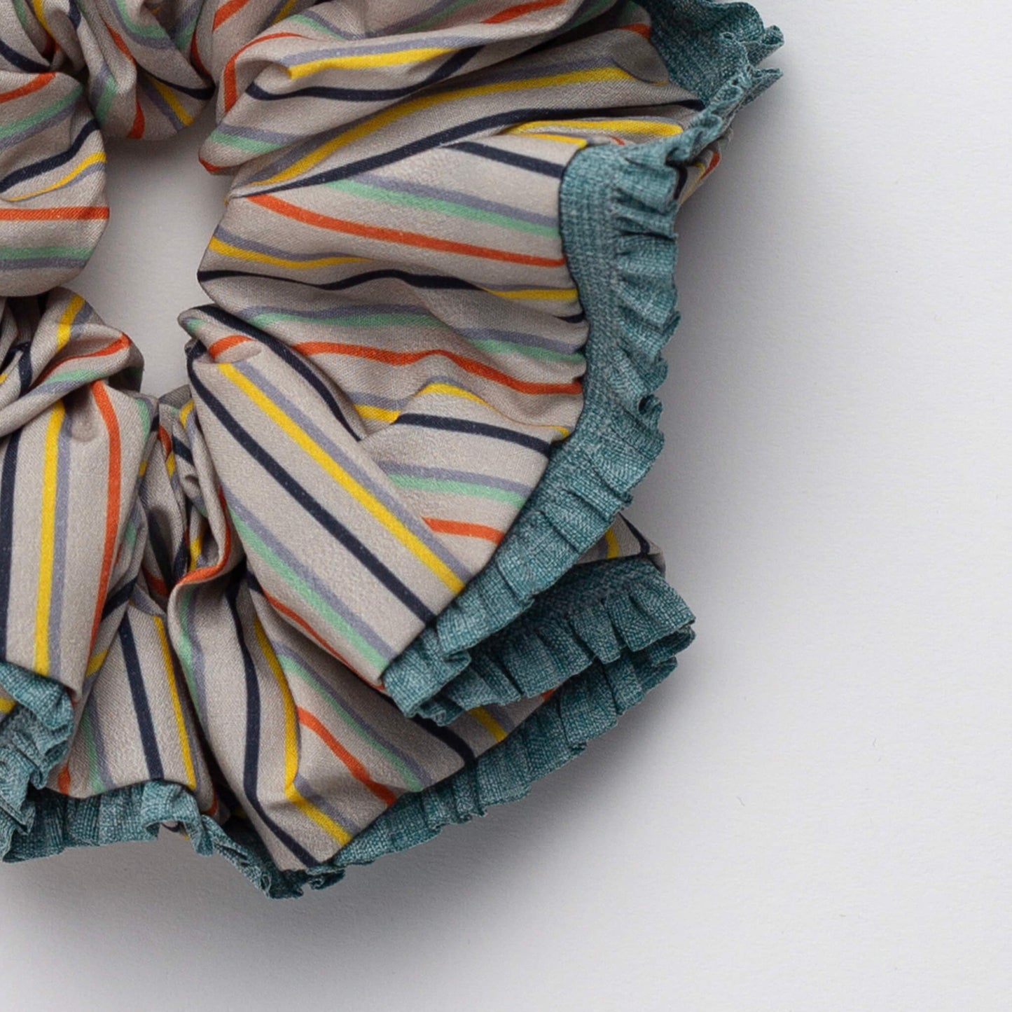 Close up of THOC Bloom Trimmed Scrunchie Multi Stripe on white background
