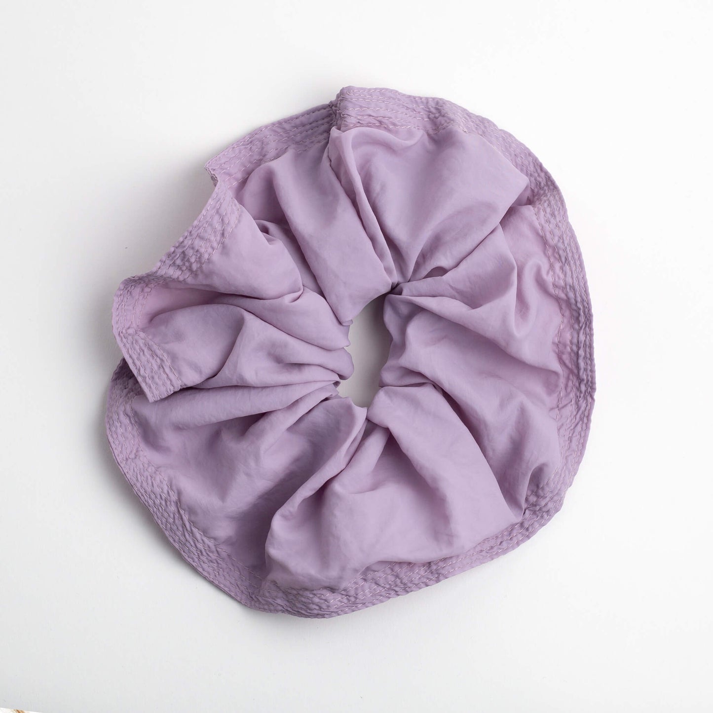 THOC Blush Scrunchie in Parma Violet colour shown on a white background