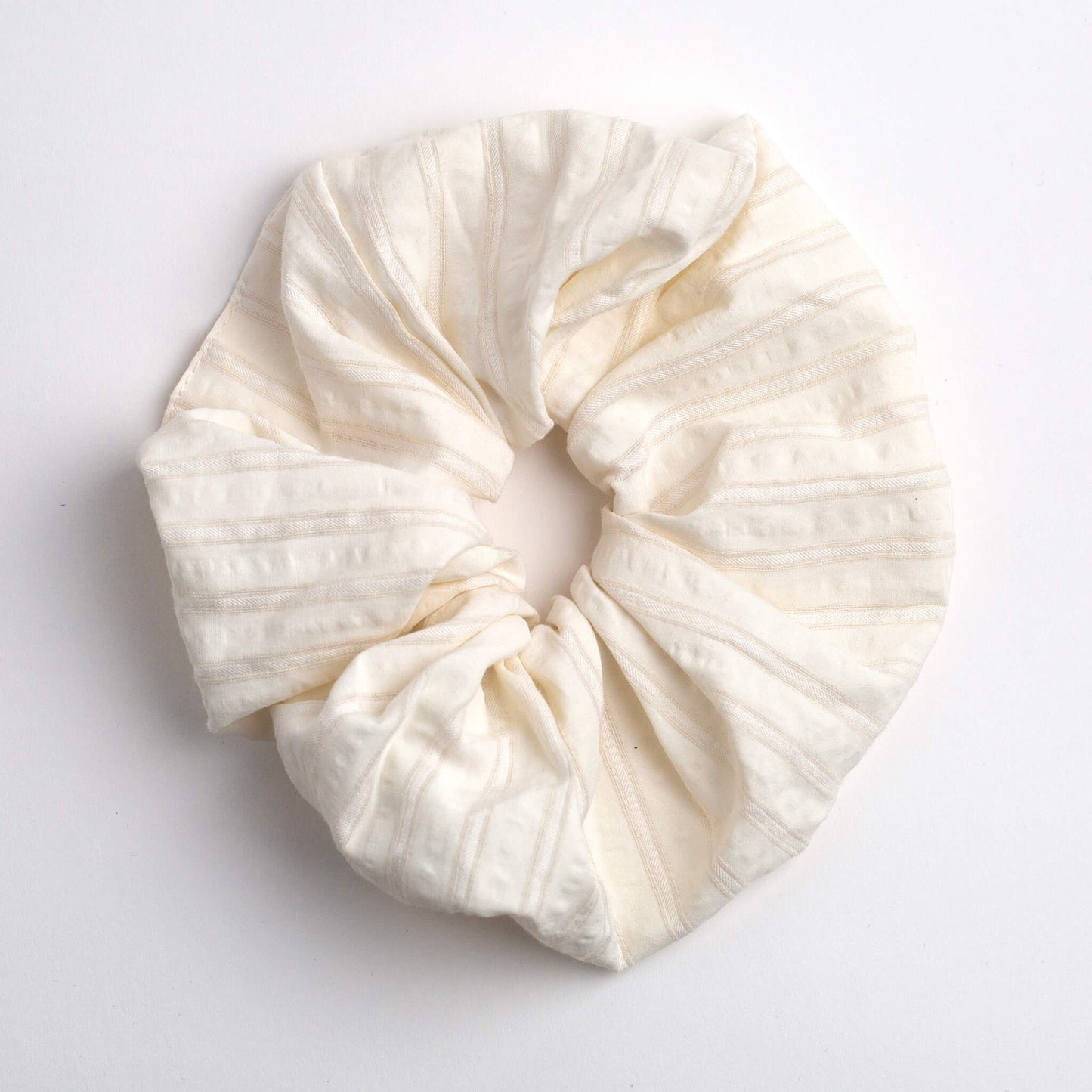 THOC Blush Stripe Scrunchie in Vanilla colour shown on a white background